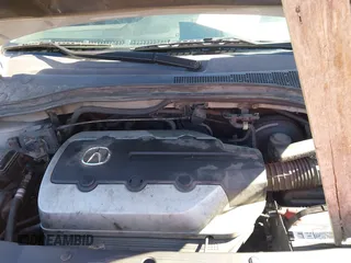 2005 Acura MDX with VIN 2HNYD18245H557011, listed as a IAAI auction lot 41572677 with 275,411 mi miles. Bid and sale history available at carsss.com. Image 10.