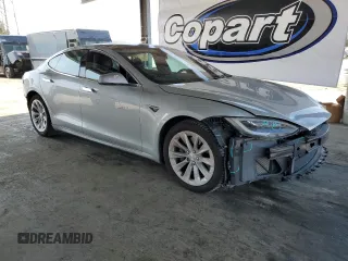 2016 Tesla Model S 90D with VIN 5YJSA1E24GF178298, listed as a Copart auction lot 52799545 with 112,391 mi miles and Salvage Title. Bid and sale history available at DreamBid. Image 4.