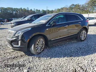 2017 Cadillac XT5 Platinum AWD with VIN 1GYKNFRS7HZ104830, listed as a Copart auction lot 46865395 with 82,937 mi miles and Salvage Title. Bid and sale history available at carsss.com. Image 1.