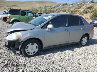 2010 Nissan Versa S with VIN 3N1BC1AP8AL457552, listed as a Copart auction lot 59703695 with 149,160 mi miles and Salvage title. Bid and sale history available at DreamBid. Image 1.