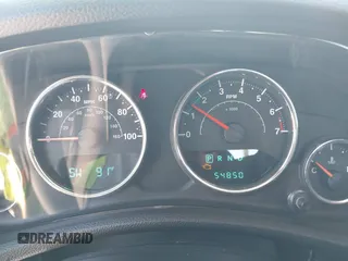 2013 Jeep Wrangler Sport with VIN 1C4AJWAG0DL542624, listed as a IAAI auction lot 42590160 with 54,850 mi miles and . Bid and sale history available at DreamBid. Image 7.
