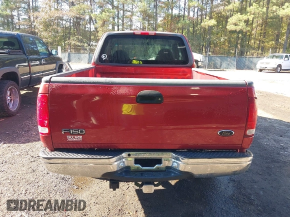2000 Ford F-150 XL with VIN 1FTRX17L7YKA59717, listed as a IAAI auction lot 40887691 with 104,095 mi miles. Bid and sale history available at carsss.com. Image 16.