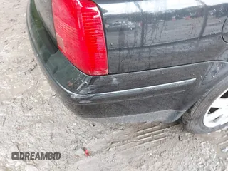 1999 Volkswagen Passat GL z VIN WVWMD63B2XE351611, wystawiony jako IAAI lot #42308007 z przebiegiem 180 893 mil mil oraz . Historia ofert i sprzedaży dostępna na DreamBid. Obrazek 6.