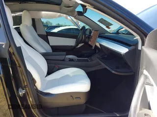 2021 Tesla Model Y Performance with VIN 5YJYGDEF6MF252877, listed as a IAAI auction lot 41770770 with 58,550 mi miles and . Bid and sale history available at DreamBid. Image 5.