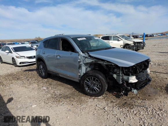 2020 Mazda CX-5 Touring with VIN JM3KFBCMXL0767254, listed as a Copart auction lot 52189335 with 96,922 mi miles and Salvage Title. Bid and sale history available at carsss.com. Image 4.