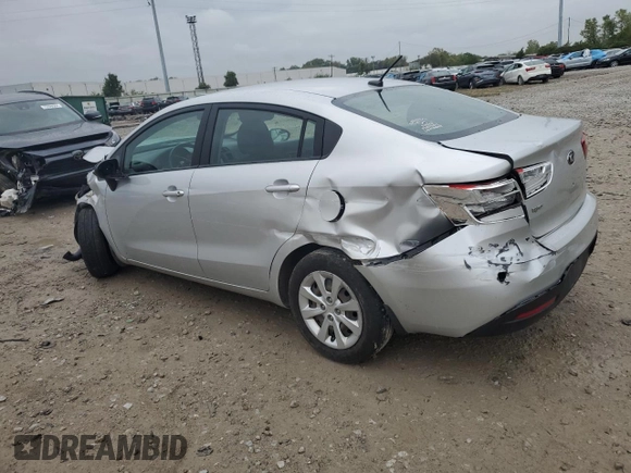 2013 Kia Rio LX with VIN KNADM4A33D6302498, listed as a Copart auction lot 73159954 with Not Provided miles and Salvage Title. Bid and sale history available at DreamBid. Image 2.