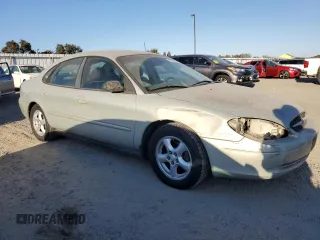 2003 Ford Taurus SE Standard with VIN 1FAFP53U13G188188, listed as a Copart auction lot 73574624 with 95,017 mi miles and Salvage Title. Bid and sale history available at DreamBid. Image 4.