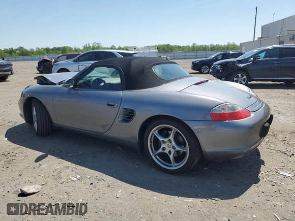 2003 Porsche Boxster with VIN WP0CA29803U623260, listed as a Copart auction lot 54511835 with 53,596 mi miles and Salvage title. Bid and sale history available at DreamBid. Image 2.