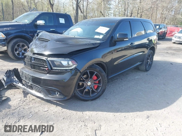 2016 Dodge Durango R/T with VIN 1C4SDJCT7GC460564, listed as a IAAI auction lot 42129759 with 134,085 mi miles and . Bid and sale history available at DreamBid. Image 2.