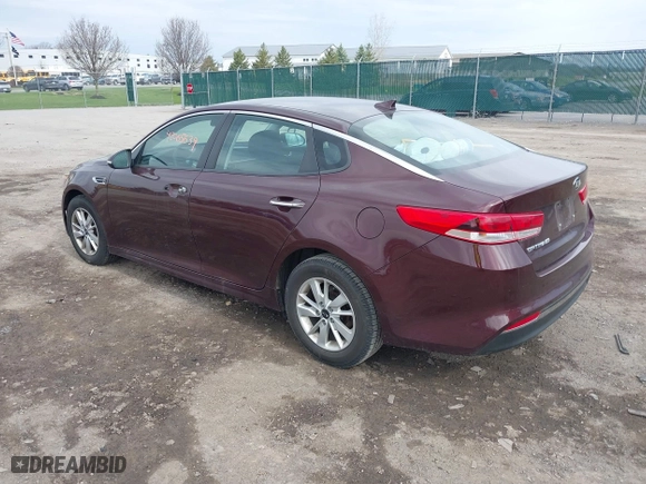 2016 Kia Optima LX with VIN 5XXGT4L36GG108599, listed as a IAAI auction lot 42065639 with 127,387 mi miles. Bid and sale history available at carsss.com. Image 3.