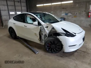 2023 Tesla Model Y Performance z VIN 7SAYGDEF6PF798103, wystawiony jako Copart lot #53607895 z przebiegiem 22 334 mil mil oraz Szkoda całkowita • Salvage title. Historia ofert i sprzedaży dostępna na DreamBid. Obrazek 4.