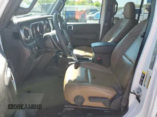 2023 Jeep Gladiator Rubicon with VIN 1C6JJTBG9PL546437, listed as a Copart auction lot 55516685 with 14,106 mi miles and Salvage title. Bid and sale history available at DreamBid. Image 7.