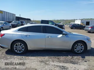 2018 Chevrolet Malibu LT with VIN 1G1ZD5ST0JF128973, listed as a IAAI auction lot 42107240 with 101,107 mi miles and . Bid and sale history available at carsss.com. Image 12.