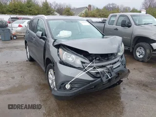 2014 Honda CR-V EX-L with VIN 2HKRM4H71EH649126, listed as a IAAI auction lot 42000855 with 150,394 mi miles. Bid and sale history available at carsss.com. Image 1.