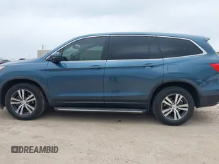 2017 Honda Pilot EX-L with VIN 5FNYF5H88HB042003, listed as a IAAI auction lot 42296542 with 172,823 mi miles and . Bid and sale history available at DreamBid. Image 14.
