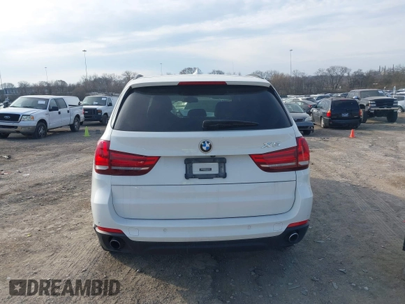 2016 BMW X5 xDrive35i with VIN 5UXKR0C5XG0P21683, listed as a IAAI auction lot 41717151 with 98,696 mi miles. Bid and sale history available at carsss.com. Image 16.