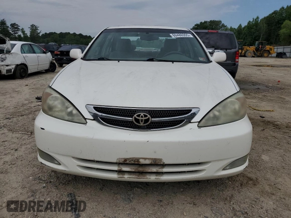2004 Toyota Camry LE z VIN JTDBE32K440281087, wystawiony jako Copart lot #60486995 z przebiegiem 229 856 mil mil oraz Czysty tytuł • Clean title. Historia ofert i sprzedaży dostępna na DreamBid. Obrazek 6.