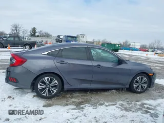 2017 Honda Civic EX-T with VIN 19XFC1E38HE031851, listed as a IAAI auction lot 41625294 with 97,432 mi miles and . Bid and sale history available at DreamBid. Image 14.
