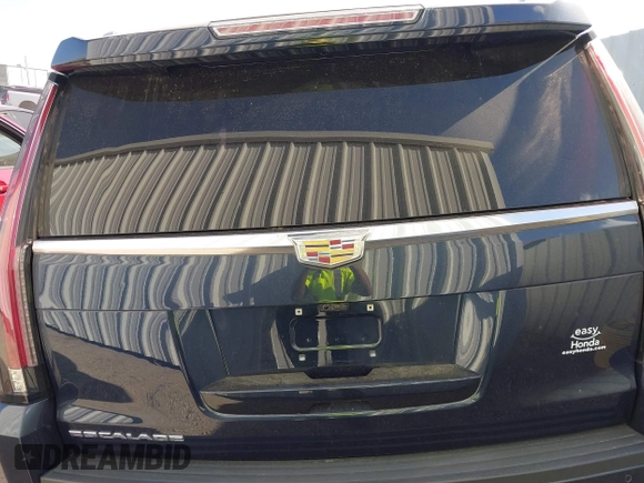 2019 Cadillac Escalade Luxury z VIN 1GYS4BKJ4KR291044, wystawiony jako IAAI lot #41818756 z przebiegiem Nie podano mil oraz . Historia ofert i sprzedaży dostępna na DreamBid. Obrazek 16.