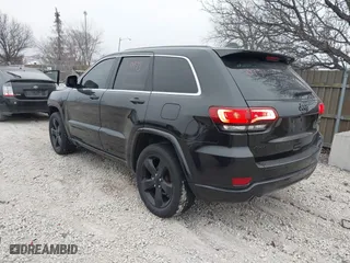 2015 Jeep Grand Cherokee Altitude with VIN 1C4RJFAG1FC210908, listed as a IAAI auction lot 41550173 with 168,905 mi miles. Bid and sale history available at carsss.com. Image 3.