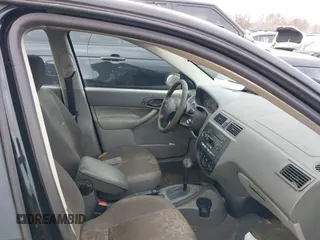 2005 Ford Focus S with VIN 1FAFP34N75W304479, listed as a IAAI auction lot 41117405 with 234,312 mi miles. Bid and sale history available at carsss.com. Image 5.