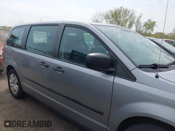 2016 Dodge Grand Caravan SE with VIN 2C4RDGBG5GR251689, listed as a IAAI auction lot 42149865 with 137,410 mi miles and . Bid and sale history available at DreamBid. Image 13.