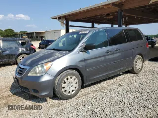 2010 Honda Odyssey LX with VIN 5FNRL3H24AB009471, listed as a Copart auction lot 59485975 with 204,215 mi miles and Salvage title. Bid and sale history available at DreamBid. Image 1.