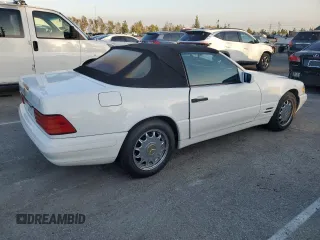 1997 Mercedes-Benz SL-Class with VIN WDBFA63F5VF143197, listed as a Copart auction lot 45003735 with 100,250 mi miles and Salvage Title. Bid and sale history available at carsss.com. Image 3.