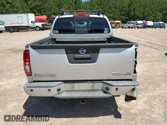 2014 Nissan Frontier SV z VIN 1N6AD0EV9EN738982, wystawiony jako Copart lot #61353985 z przebiegiem 205 593 mil mil oraz Szkoda całkowita • Salvage title. Historia ofert i sprzedaży dostępna na DreamBid. Obrazek 6.