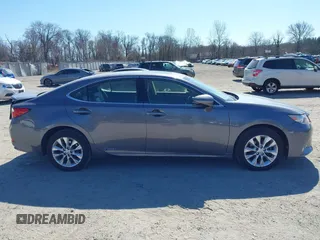 2014 Lexus ES 300h с VIN JTHBW1GG6E2071083, выставлен на аукционе IAAI как лот 41772226 с пробегом 140 710 миль миль и . История ставок и продаж доступна на DreamBid. Изображение 13.