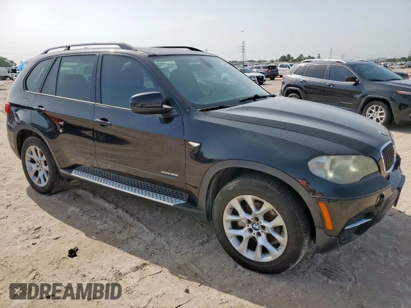2012 BMW X5 35i with VIN 5UXZV4C54CL754852, listed as a Copart auction lot 62836055 with 108,627 mi miles and Clean title. Bid and sale history available at DreamBid. Image 4.