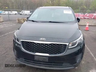 2016 Kia Sedona LX with VIN KNDMB5C1XG6171343, listed as a IAAI auction lot 42183042 with 87,740 mi miles. Bid and sale history available at carsss.com. Image 6.