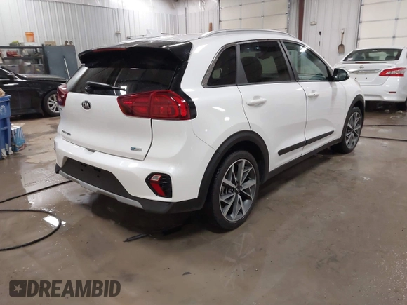2021 Kia Niro Touring with VIN KNDCC3LC3M5463514, listed as a IAAI auction lot 41564596 with 29,063 mi miles. Bid and sale history available at carsss.com. Image 4.