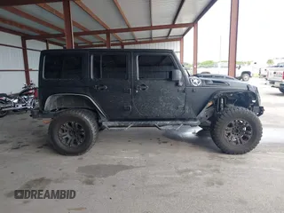2012 Jeep Wrangler Unlimited Sport с VIN 1C4BJWDGXCL154296, выставлен на аукционе IAAI как лот 42748480 с пробегом 100 921 миль миль и . История ставок и продаж доступна на DreamBid. Изображение 13.