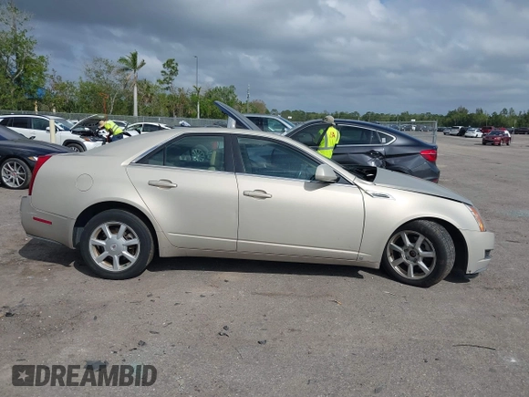 2008 Cadillac CTS AWD z VIN 1G6DG577280155483, wystawiony jako IAAI lot #41723609 z przebiegiem 132 756 mil mil oraz . Historia ofert i sprzedaży dostępna na DreamBid. Obrazek 13.