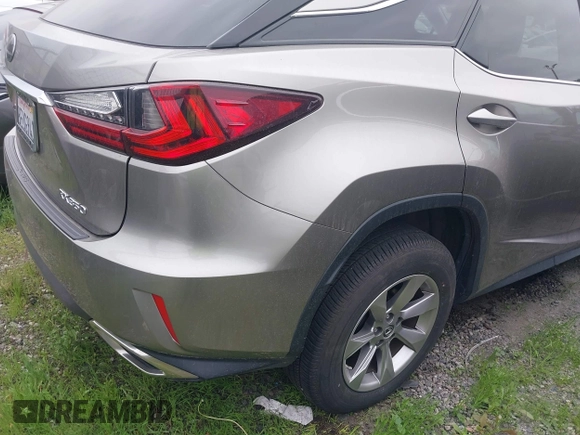 2018 Lexus RX with VIN 2T2ZZMCA1JC104444, listed as a IAAI auction lot 41773351 with 62,198 mi miles. Bid and sale history available at carsss.com. Image 4.