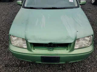 1999 Volkswagen Jetta z VIN 3VWSC29M1XM015418, wystawiony jako Copart lot #75756904 z przebiegiem 195 604 mil mil oraz Szkoda całkowita • Salvage title. Historia ofert i sprzedaży dostępna na DreamBid. Obrazek 11.