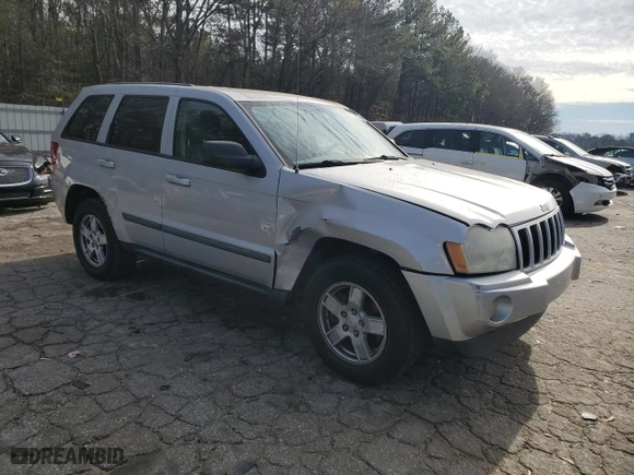 2007 Jeep Grand Cherokee Laredo with VIN 1J8HS48P57C697382, listed as a Copart auction lot 87682865 with 154,732 mi miles and Salvage Title. Bid and sale history available at carsss.com. Image 4.