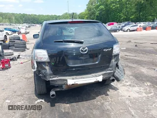 2010 Mazda CX-7 Touring z VIN JM3ER2W30A0341657, wystawiony jako IAAI lot #42123453 z przebiegiem 173 135 mil mil oraz . Historia ofert i sprzedaży dostępna na DreamBid. Obrazek 6.