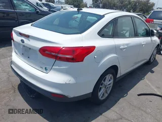 2017 Ford Focus SE with VIN 1FADP3F21HL217838, listed as a IAAI auction lot 42560331 with 154,406 mi miles and . Bid and sale history available at DreamBid. Image 4.