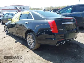 2014 Cadillac CTS Luxury RWD with VIN 1G6AR5SX4E0165254, listed as a IAAI auction lot 41938674 with 54,470 mi miles. Bid and sale history available at carsss.com. Image 3.