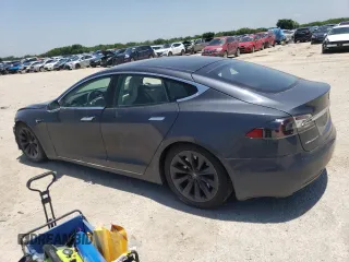 2017 Tesla Model S 100D with VIN 5YJSA1E25HF220902, listed as a Copart auction lot 56442684 with 83,297 mi miles and Salvage title. Bid and sale history available at DreamBid. Image 2.