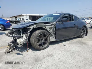 2013 Scion FR-S z VIN JF1ZNAA13D1715608, wystawiony jako Copart lot #57275095 z przebiegiem 62 842 mil mil oraz Szkoda całkowita • Salvage title. Historia ofert i sprzedaży dostępna na DreamBid. Obrazek 1.