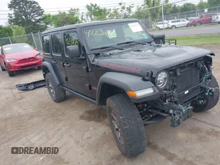 2022 Jeep Wrangler Unlimited Rubicon с VIN 1C4HJXFN0NW271351, выставлен на аукционе IAAI как лот 42230770 с пробегом 36 463 миль миль и . История ставок и продаж доступна на DreamBid. Изображение 1.