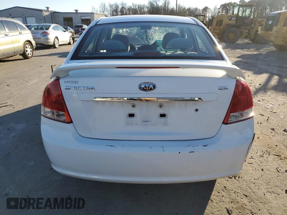 2009 Kia Spectra EX z VIN KNAFE222395623700, wystawiony jako Copart lot #86279424 z przebiegiem 195 991 mil mil oraz Szkoda całkowita • Salvage title. Historia ofert i sprzedaży dostępna na DreamBid. Obrazek 6.