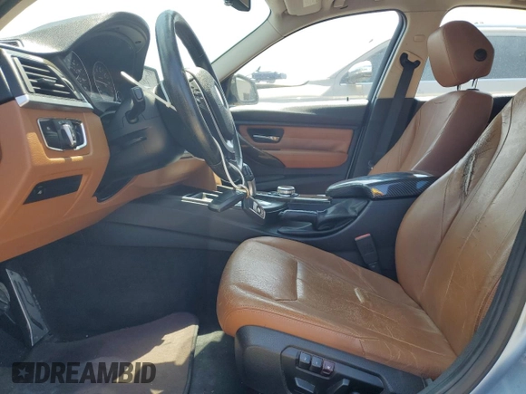 2013 BMW 3 Series 328i with VIN WBA3A5G59DNP20265, listed as a Copart auction lot 61650995 with 221,317 mi miles and Clean title. Bid and sale history available at DreamBid. Image 7.