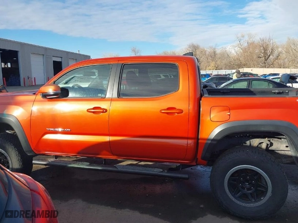 2016 Toyota Tacoma SR with VIN 3TMCZ5AN6GM032601, listed as a IAAI auction lot 41408996 with 76,467 mi miles. Bid and sale history available at carsss.com. Image 14.