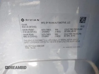 2022 Rivian R1T Adventure Package with VIN 7FCTGAAA1NN012328, listed as a IAAI auction lot 41307929 with 13,588 mi miles. Bid and sale history available at carsss.com. Image 9.