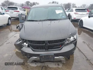 2016 Dodge Journey Crossroad Plus z VIN 3C4PDCGG3GT143609, wystawiony jako IAAI lot #41279192 z przebiegiem 181 148 mil mil oraz . Historia ofert i sprzedaży dostępna na DreamBid. Obrazek 13.