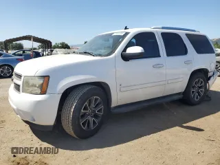 2007 Chevrolet Tahoe LTZ with VIN 1GNFC13J47R182259, listed as a Copart auction lot 57441205 with 204,898 mi miles and Salvage title. Bid and sale history available at DreamBid. Image 1.